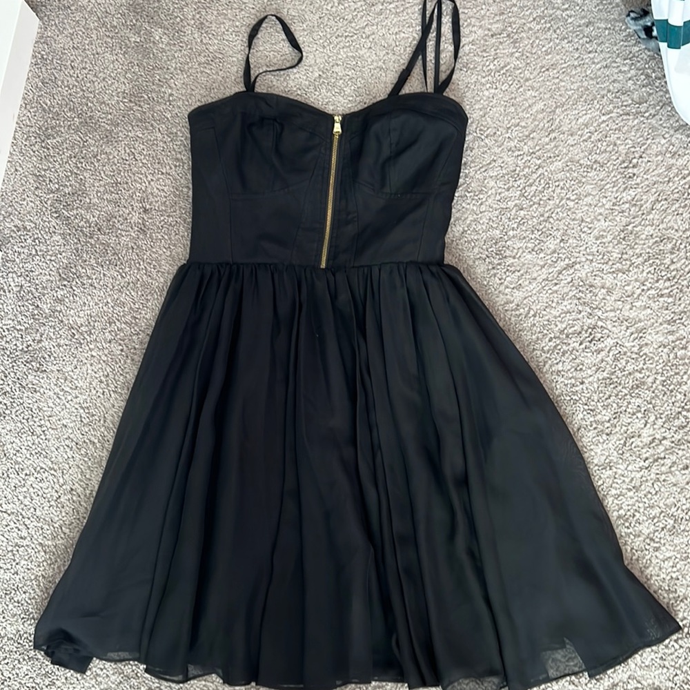The dress no longer fits as I’ve has two kids and I’m no longer a size two.